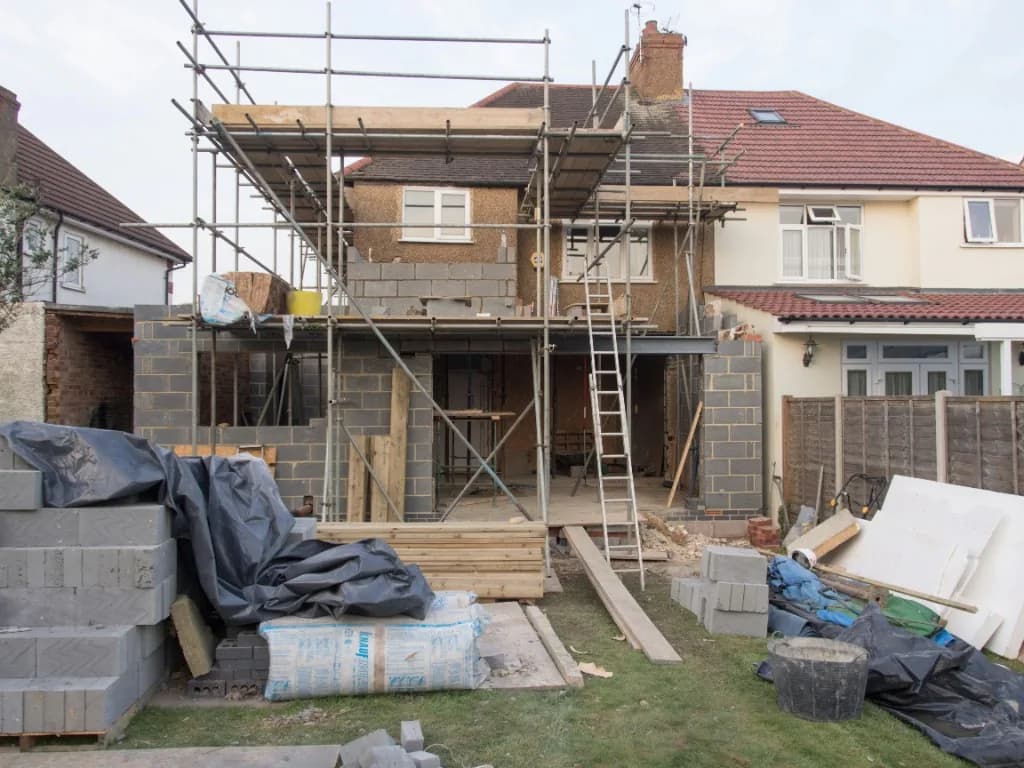 Rear home extension under construction with blockwork and scaffolding